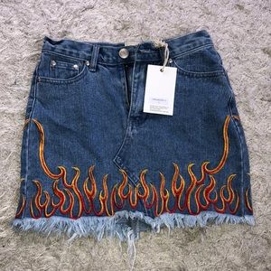 Cute denim mini skirt with flames on bottom